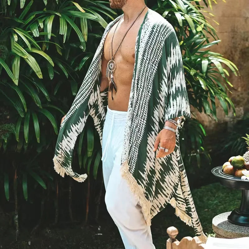 Tulum Green Fringe Kimono in 100% rayon with green and cream stripes, relaxed sleeves, and fringe trim.