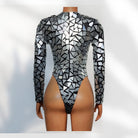 Mannequin wearing a black and silver geometric patterned bodysuit on a white background
