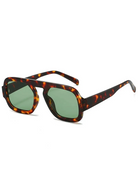 Brussels retro square sunglasses featuring a tortoiseshell polycarbonate frame and green UV-400 resin lenses.