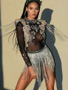 Body de festival con borlas y pedrería brillante, perfecto para festivales.