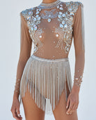 Alma Rhinestone Fringe Festival Bodysuit: sheer nude spandex, embellished with sparkling rhinestones, sequins, and silver tassels.