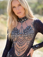 Aurora Black Rhinestone Jumpsuit with intricate silver rhinestone embellishments on sheer black fabric.