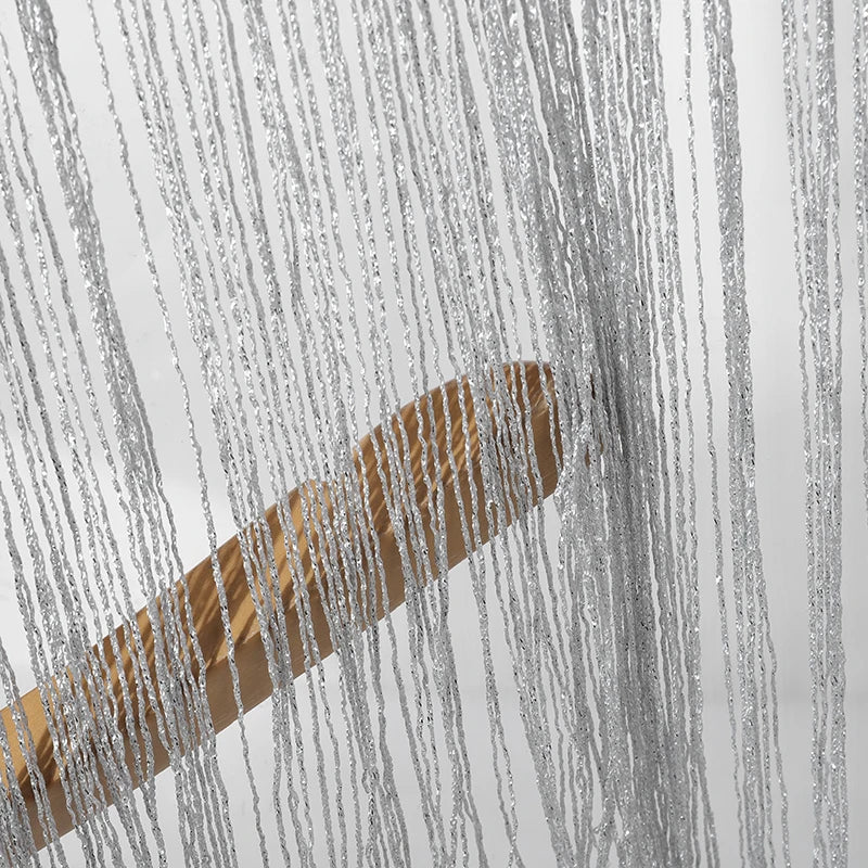 close-up tassel fringe crop top with shimmering silver tassels and playful movement