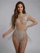 Nude spandex bodysuit with iridescent rhinestones, sequins, and long silver fringe tassels on shoulders and waist.