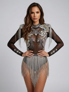 Black sheer mesh bodysuit with iridescent rhinestones, sequins, and silver fringe tassels.