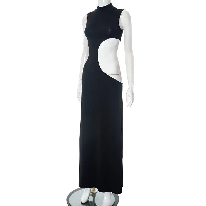 Cut Out Maxi Dress featuring high stretch polyester and spandex blend with playful cut outs.
