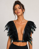 Black feather top with adjustable leather-look straps and a deep V-neck, worn by a model.