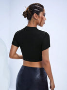 black keyhole crop top back-view highlighting keyhole detail and cropped design