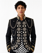 Black military-style festival jacket featuring silver chain embellishments, decorative metal buttons, and stone accents.
