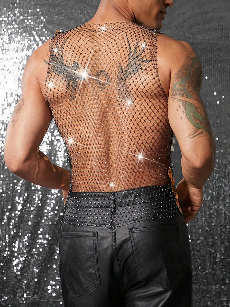 Men's black mirror disc chain vest, handmade with reflective discs, worn over bare skin.