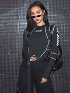 Black Rave Bodysuit featuring stylish long sleeves and sleek design, ideal for raves and techno parties.