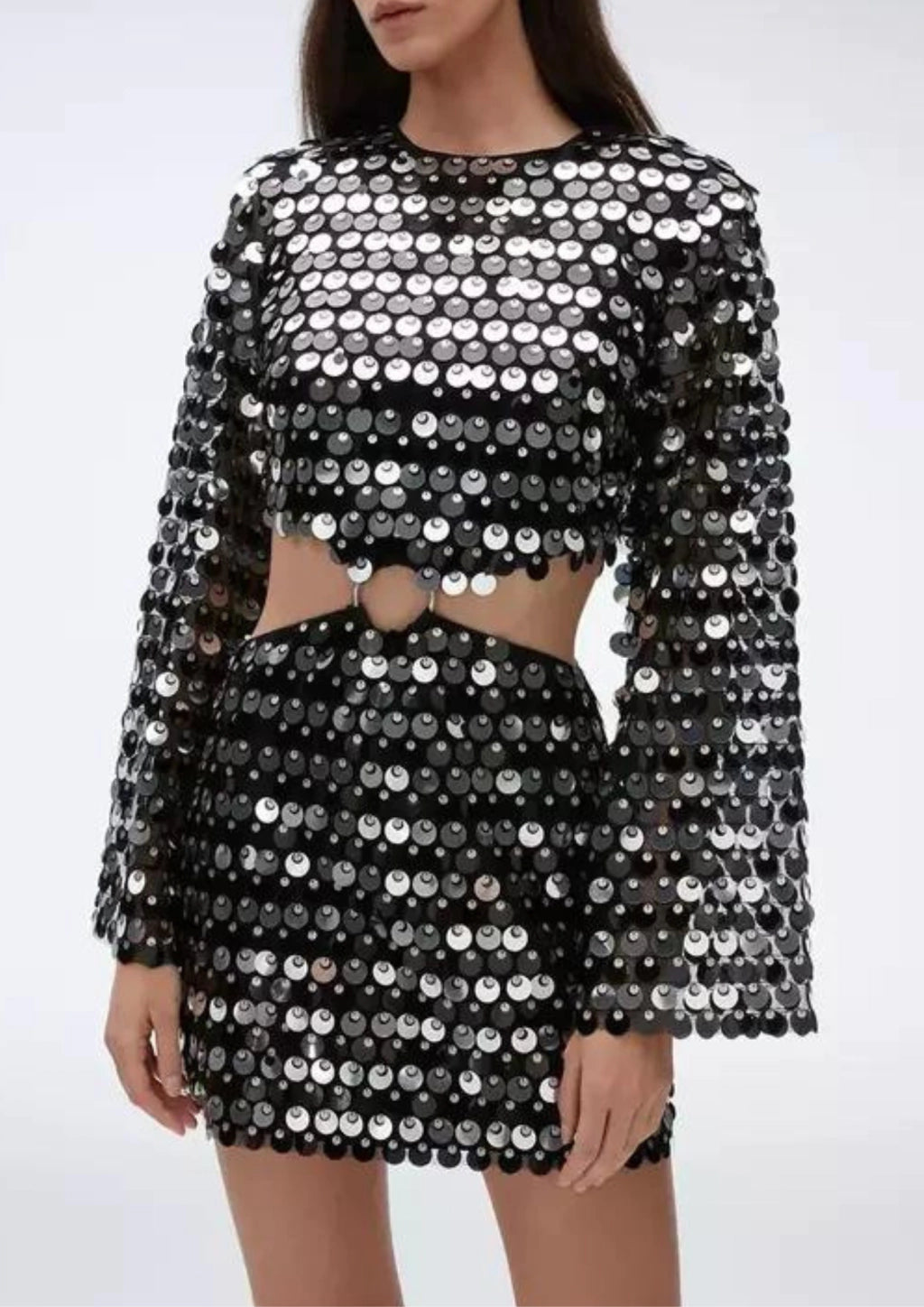Black Sequin Hollow-Out Mini Party Dress with dazzling sequins and cut-out details for a striking look.