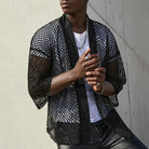 Black Sheer Loose Knit Cardigan worn by a man, showcasing a stylish and trendy design.
