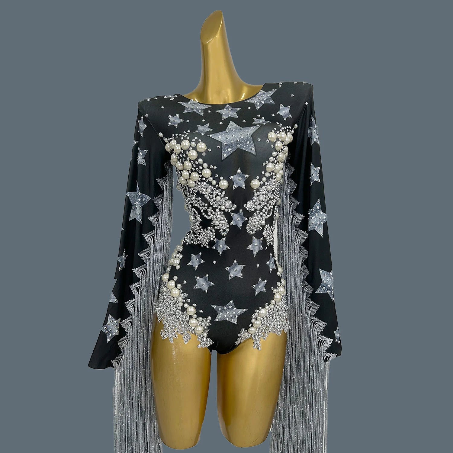 black star fringe bodysuit full-shot with rhinestones and pearl accents on a black background