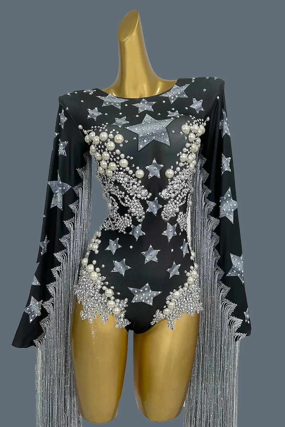 black star fringe bodysuit full-shot with rhinestones and pearl accents on a black background