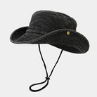 Sombrero tipo pescador Washed Fishman en negro, hecho de algodón suave con cordón ajustable para mayor comodidad.
