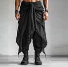 Pantalones holgados para Hombre en negro con un diseño único de drapeado para estilo festival.