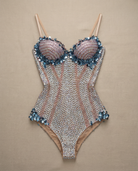 Stella Beige Rhinestone Corset Bodysuit with silver and warm crystal rhinestones, floral trim, and slim straps.