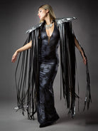 Cosplay Long Tassel Wings showcased, featuring flowing black tassels and a stylish dress.