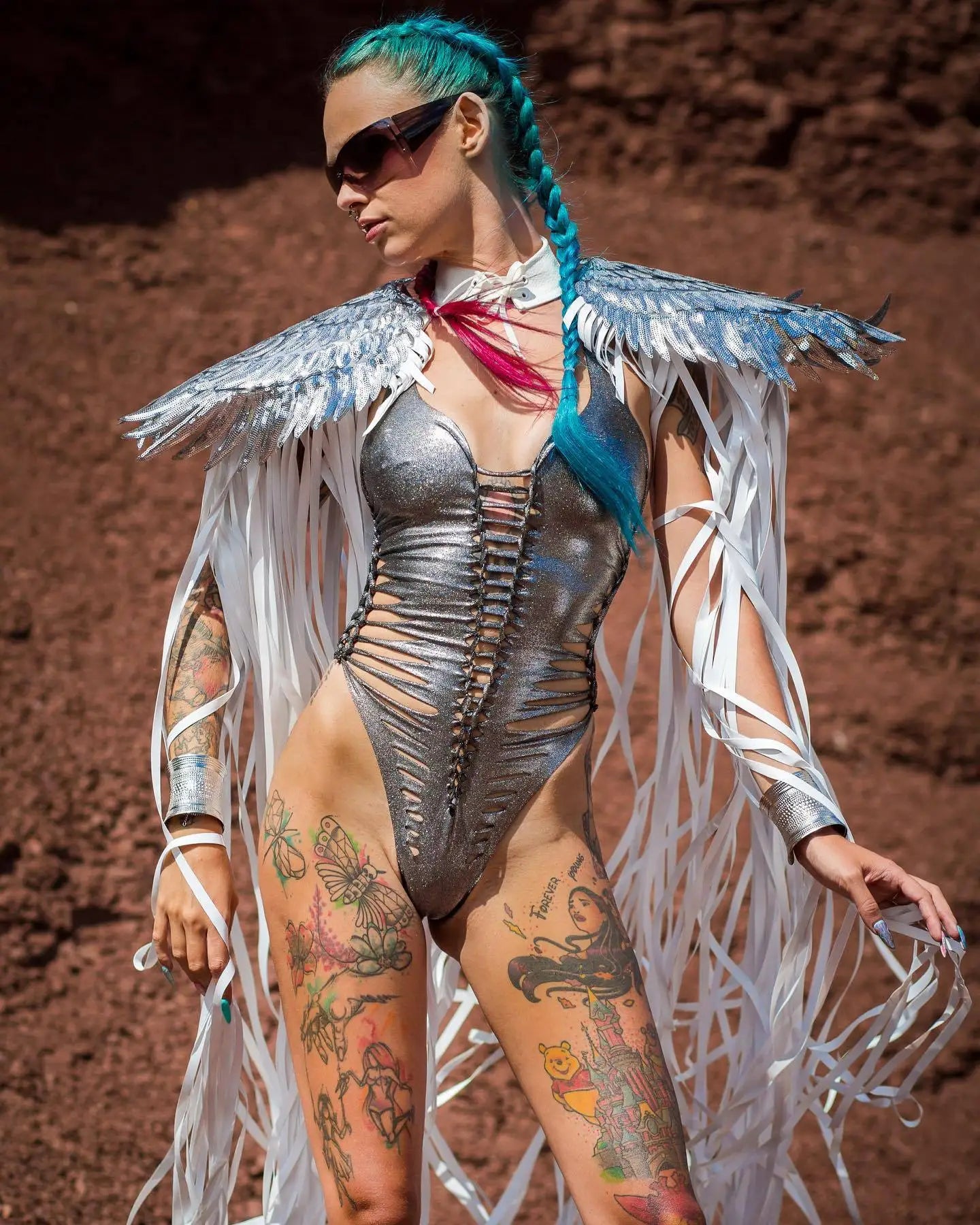 Cosplay Long Tassel Wings showcased with a shimmering silver outfit and flowing tassels.