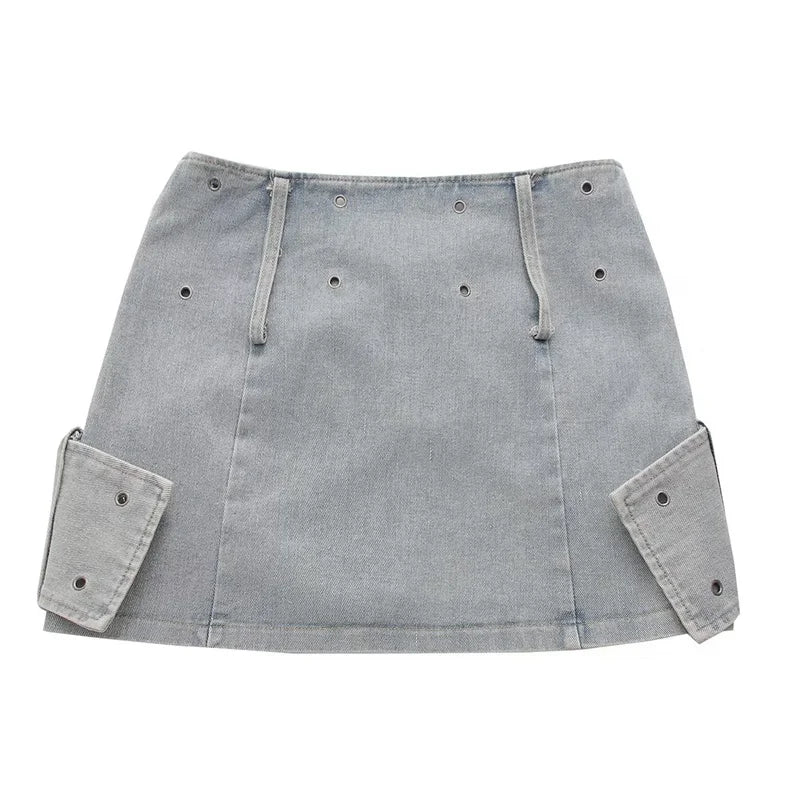 Cross Belt Denim Mini Skirt featuring unique cross belt design and playful mini length.