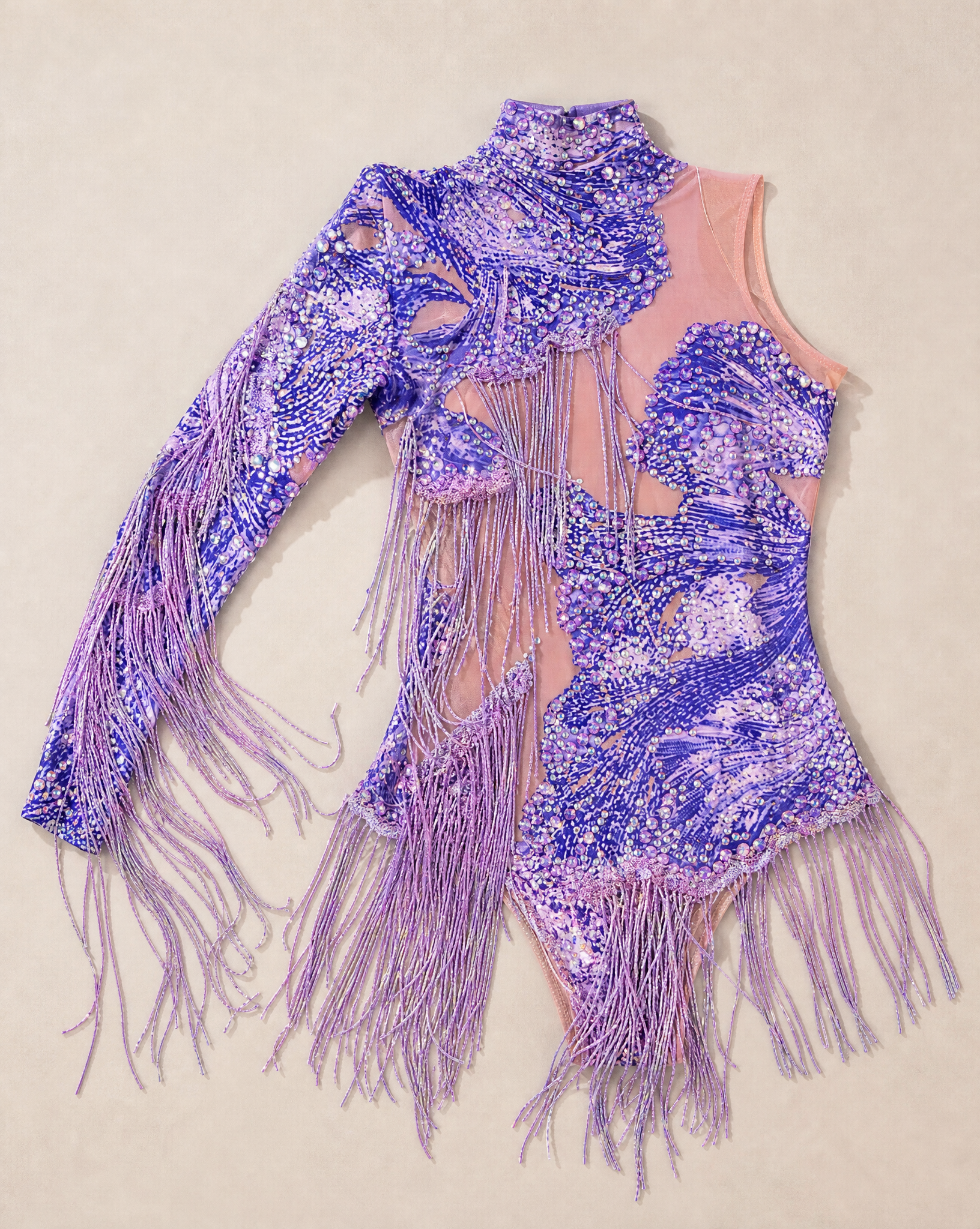 Frida Purple Rhinestone Fringe Bodysuit with one-shoulder, high neck, and nude spandex base.