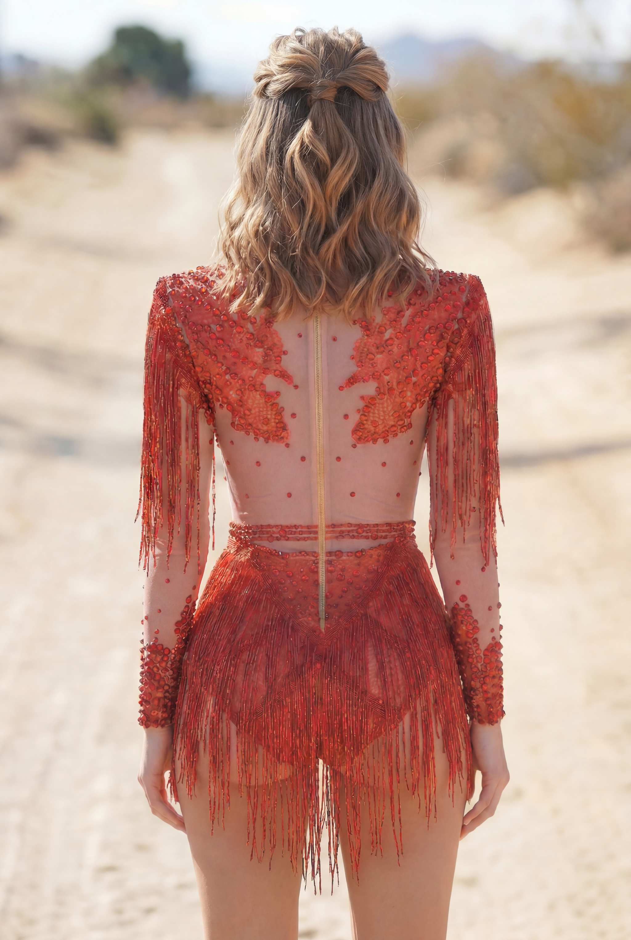 Georgia Red Rhinestone Fringe Bodysuit, featuring hand-glued rhinestones, sequins, and fringe on a spandex base.