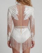 White rhinestone and sequin fringe bodysuit with sheer back, pearl embellishments, and concealed zipper.
