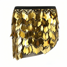 Gold sequin mini skirt featuring diamond-shaped metallic scales, a black elastic waistband, and delicate chain detailing.