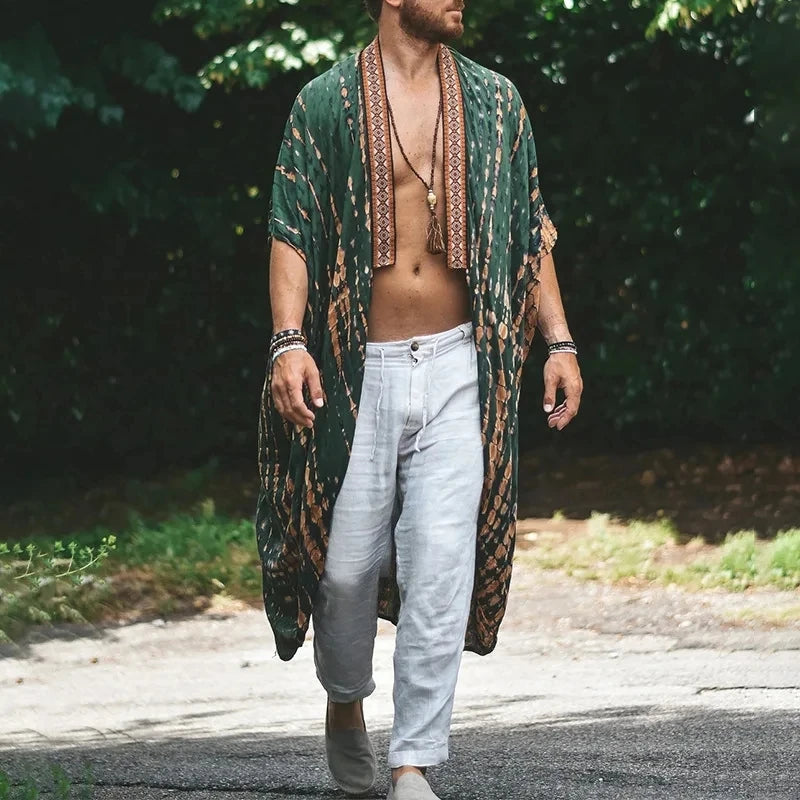 Kimono tribal vert Bali unisexe en rayonne avec imprimé géométrique, franges et fentes latérales.