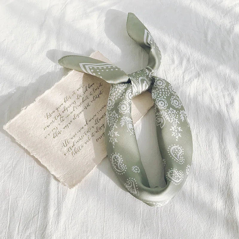 Satin Bandana in green with paisley print, perfect for daily wear or stylish festival outfits.