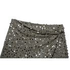 Green sequin crossover mini skirt with a stretch spandex base and all-over shimmer.