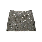 Green sequin crossover mini skirt with a stretch spandex base and all-over shimmer.