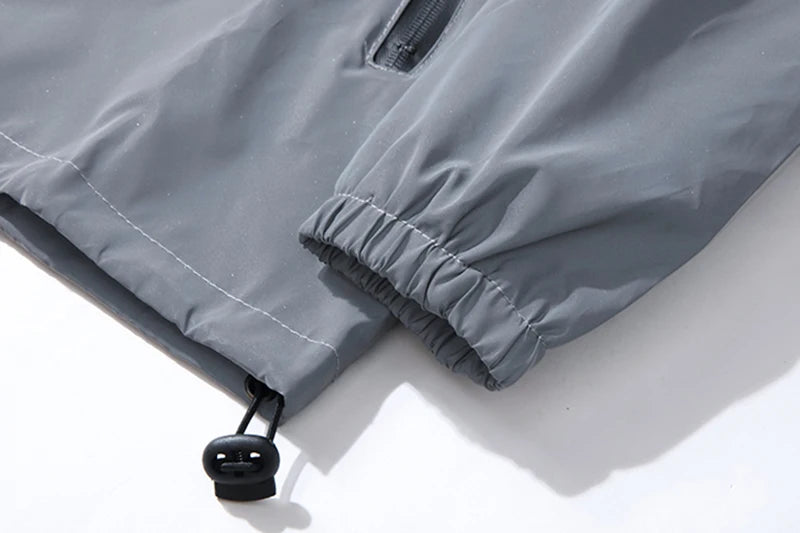 Close-up of the cuff detailing on the Grey Reflective Festival Jacket, showcasing premium quality material.
