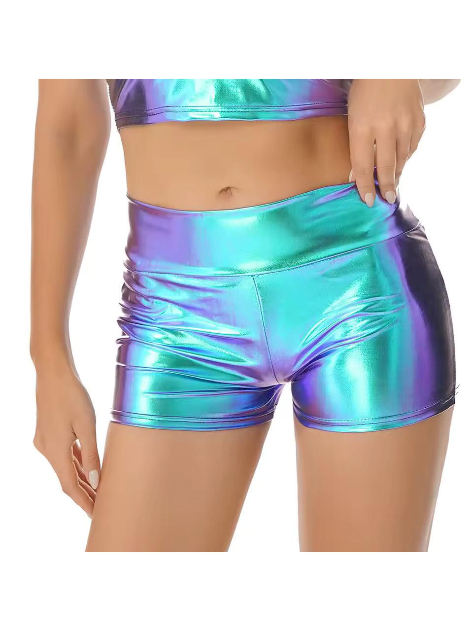 Holographic crop top and low-rise shorts set in iridescent blue and purple polyester.