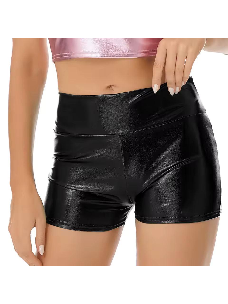 Black glossy low-rise hot shorts with an elastic waistband, paired with a pink holographic crop top.