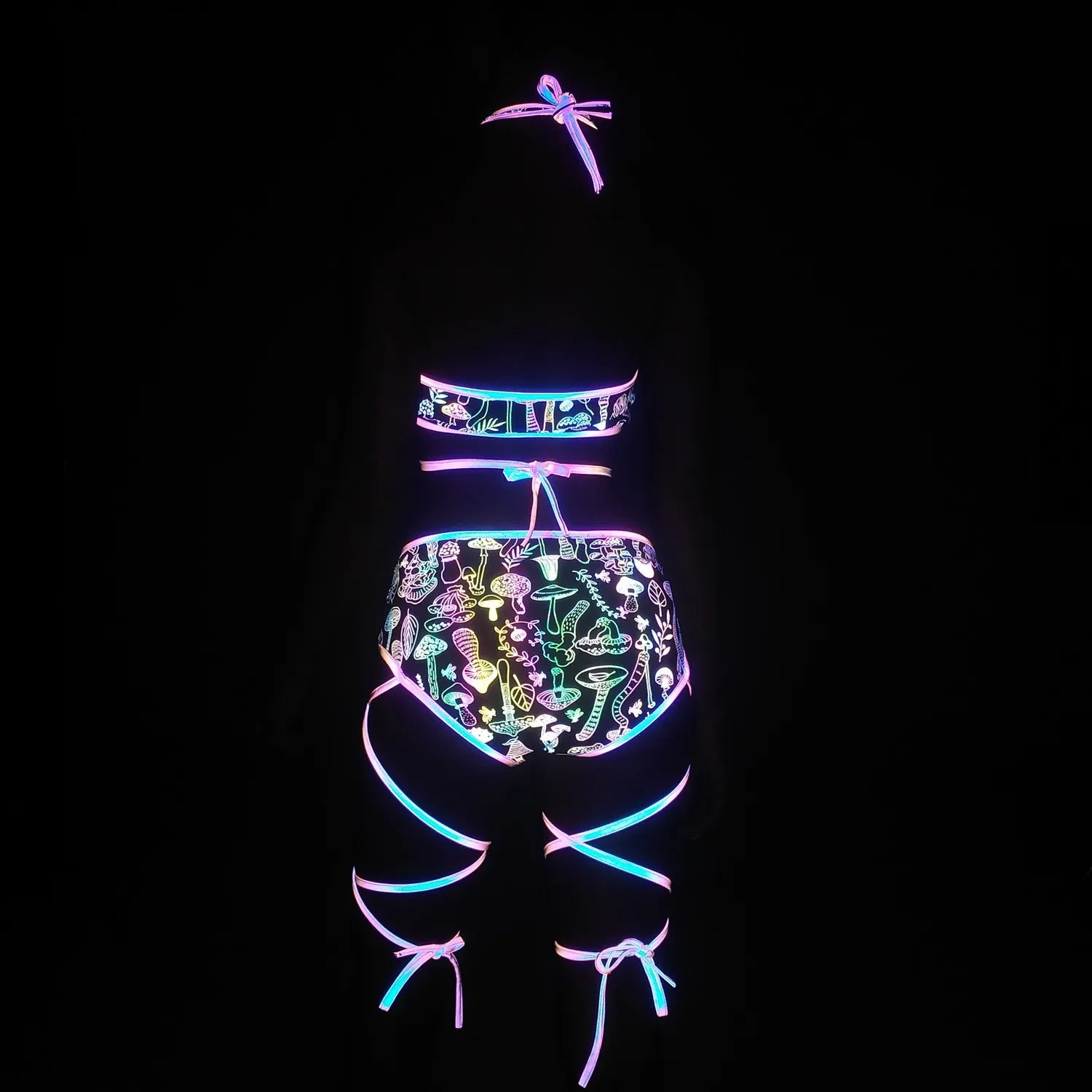 back-view holographic reflective bikini set with colorful patterns glowing in dark