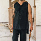 Hooded Sleeveless Cardigan in dark gray fabric, perfect for layering and festival outfits.