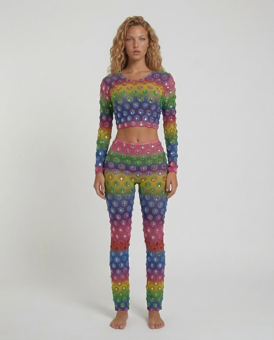 Multicolor rhinestone mesh crop top and fitted leggings set with a rainbow gradient.