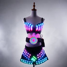 Black LED light-up rave set featuring a remote-controlled bra, belt, and shorts with multi-color glowing lights on a mannequin.