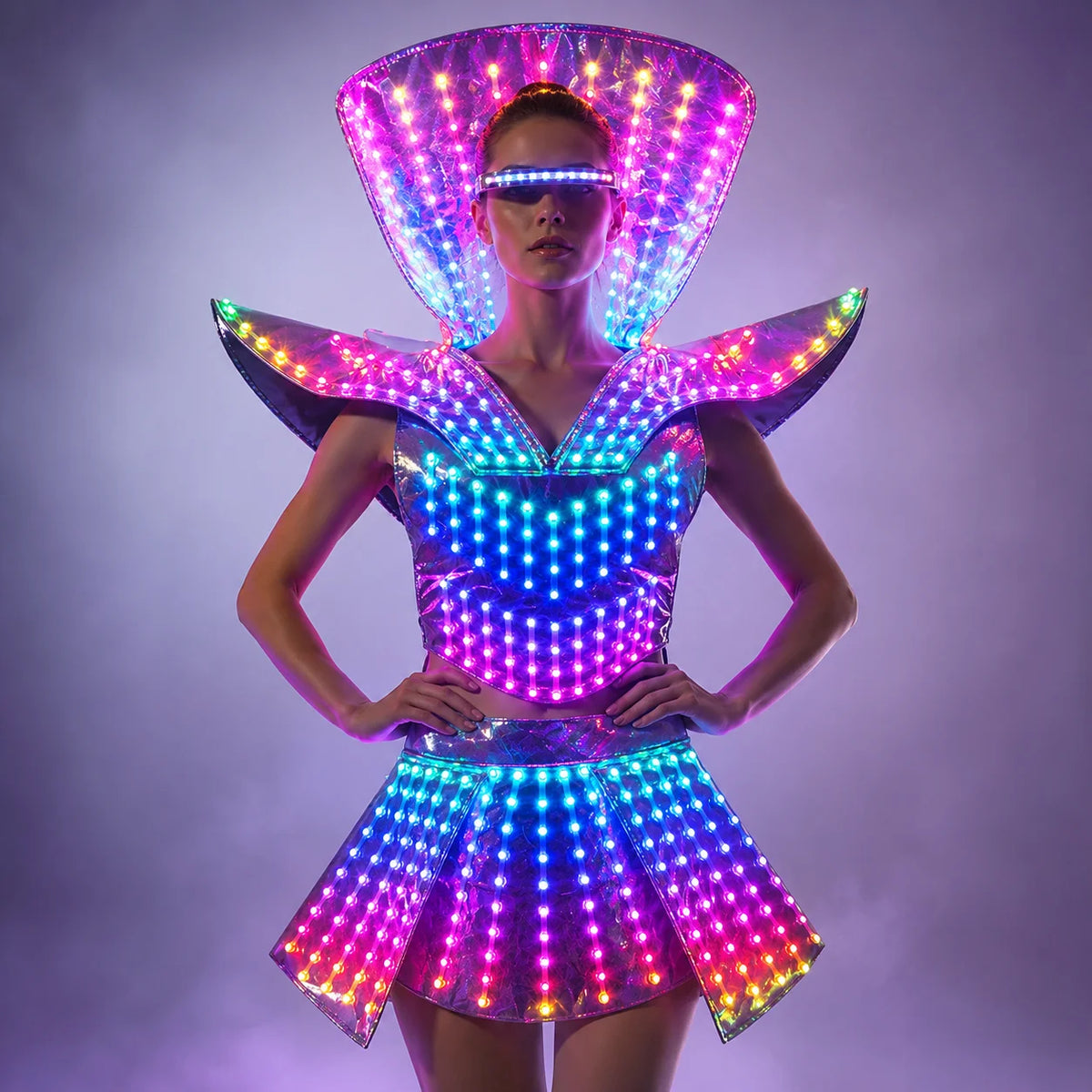 Futuristic LED shoulder armor dress with a glowing mini skirt and remote-controlled multi-color lights on a metallic base.