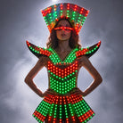 Futuristic LED shoulder armor dress with red and green lights, structured metallic fabric, and matching illuminated eyewear.