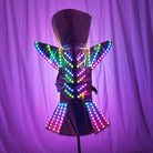 Futuristic LED shoulder armor dress with remote-controlled multicolor lights and structured metallic fabric silhouette.