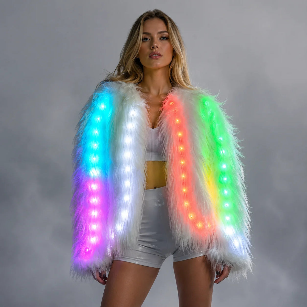 Model wearing a plush white faux fur jacket featuring integrated, multi-colored LED light strips.