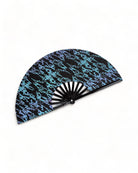Folding Holographic Hand Fan featuring a vibrant black and teal abstract design for stylish cooling.