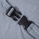 Primer plano del detalle elegante de la hebilla del cinturón en el Body de Manga Larga con Cinturón.