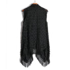 Gilet noir Lucian Boho à franges avec corps texturé et pampilles à franges dramatiques.