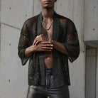 Stylish Black Sheer Loose Knit Cardigan with open knit design, perfect for festivals and parties.