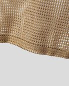 Close-up of a khaki mesh hooded tank top for men, showcasing its open-grid polyester material.