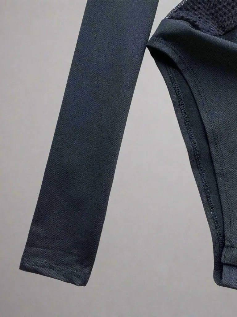 Dark grey polyester mesh patchwork bodysuit with long sleeves, ideal for festivals.